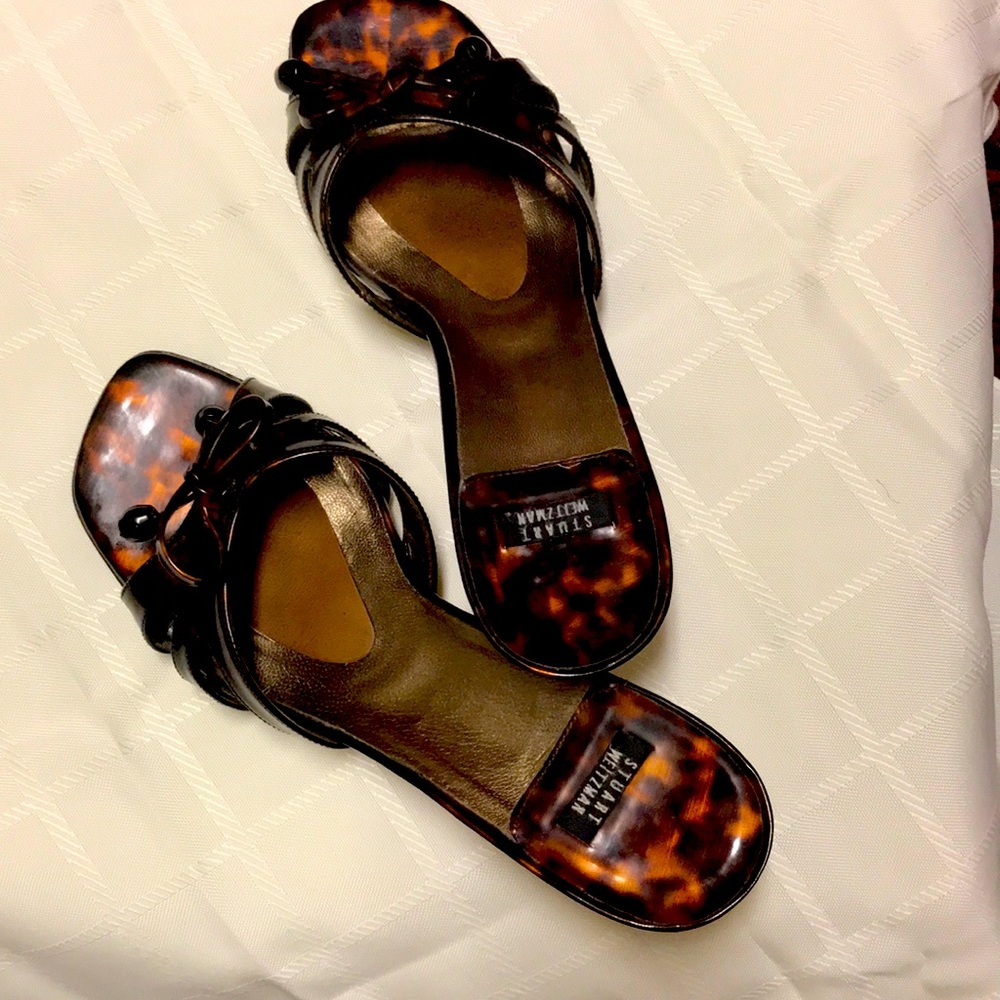 Stuart Weitzman size 6 1/2B tortoise slips with bow detail.